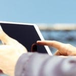 close up view of engineer using tablet at a construction site